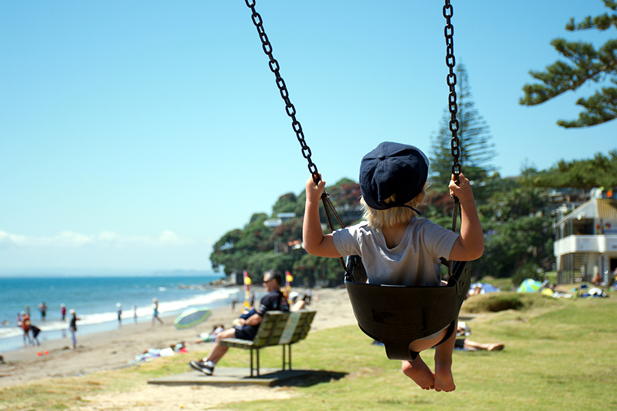 boy swinging